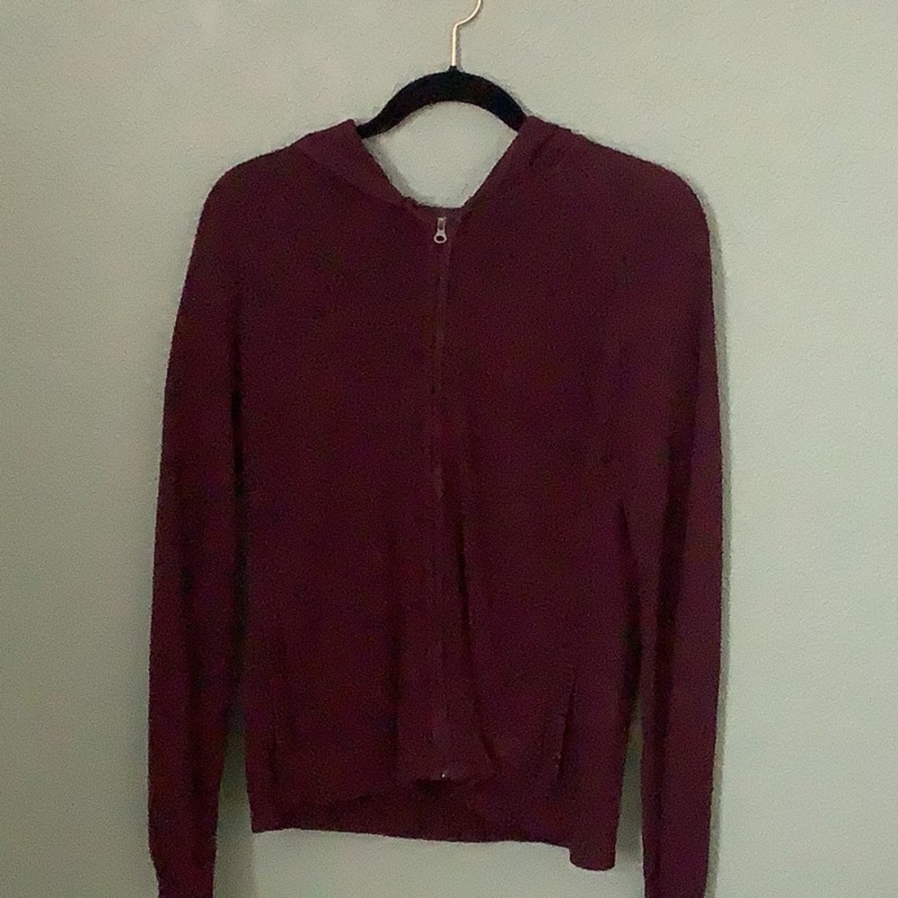 Women’s REI zip up sweater with pockets.